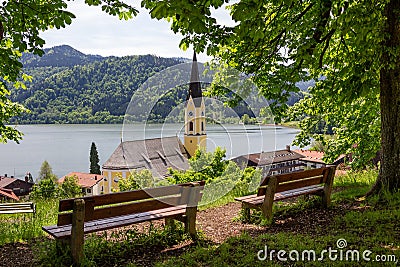 Lookout point above schliersee village with wooden benches Stock Photo