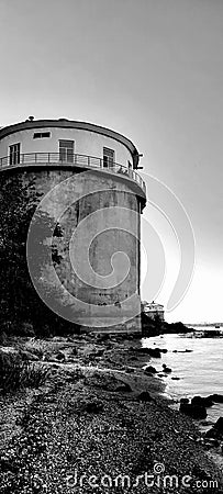 it looks like a lighthouse. coastal buildings Stock Photo