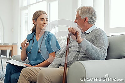 It looks like youve been following the list. a young doctor running through a checklist with her patient during a Stock Photo