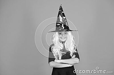 Looks perfect. trick or treat. supernatural charmer gray hair. kid enchantress orange background. happy halloween. magic Stock Photo