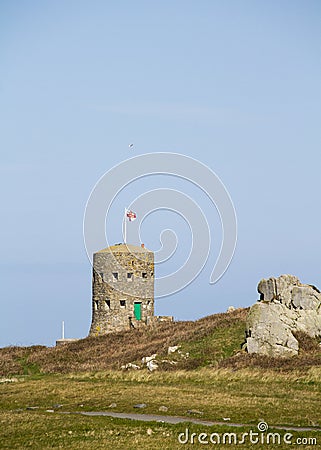 Loophole towers in Guernsey that guard the coastline. Stock Photo