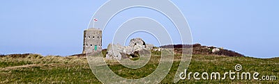 Loophole towers in Guernsey that guard the coastline. Stock Photo