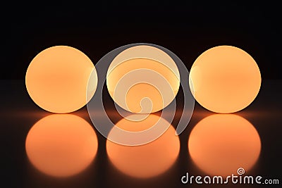 looping animation of soft glowing orbs, gently pulsing and expanding in a smooth, rhythmic motion, Stock Photo