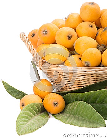 Loquat fruits in the basket Stock Photo