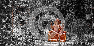 Lord Ganesha Idol in a Jungle Stock Photo