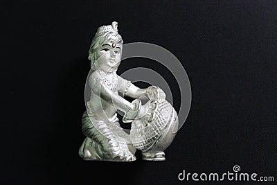 Lord krishna made in silver statue Stock Photo