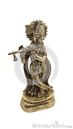 lord krishna playing flute shiny bronze statue Stock Photo