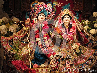 Lord krishna and radha rani with iskcon temple Stock Photo