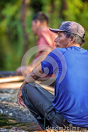 LORETO, PERU - JANUARY 02: Unidentified locals fishing in the ri Editorial Stock Photo