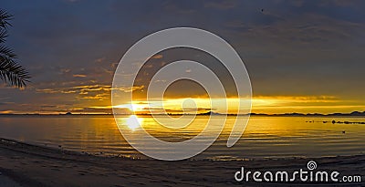 Los Alcazares, Murcia, Spain. Amazing sunrise at seaside with sun reflection on water Stock Photo