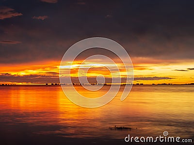 Los Alcazares, Region of Murcia, Spain. Amazing sunrise at seaside with sun reflection on water Stock Photo