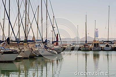 LOS ALCAZARES, SPAIN - FEBRUARY 25, 2019 Nice boats in a small marina in a seaside town, Mas Menor, Spain Editorial Stock Photo