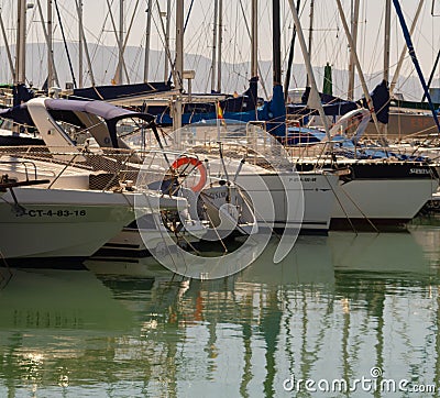 LOS ALCAZARES, SPAIN - FEBRUARY 25, 2019 Nice boats in a small marina in a seaside town, Mas Menor, Spain Editorial Stock Photo