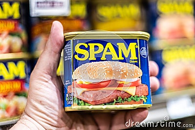 Los Angeles, CA/USA 9/23/2020 Customer hand holding a Tin can of SPAM brand Meat in a supermarket aisle Editorial Stock Photo