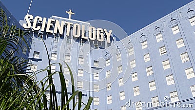 Church of Scientology exterior, facade of blue building, logo and cross. Los Angeles California USA Editorial Stock Photo