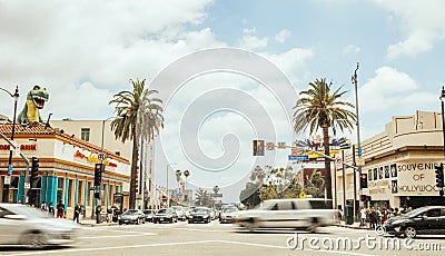 Tourist traffic at the crossroads on Hollywood Blvd. Los Angeles Tourist Attraction in the daytime. Noon in Hollywood Editorial Stock Photo