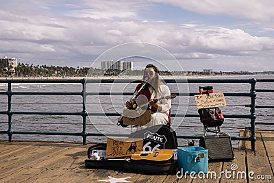 Street musician on the Santa Monica beach Editorial Stock Photo