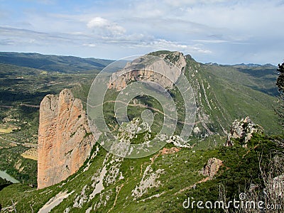 Los Mallos de Riglos unusual shaped red conglomerate rock formation in Spain Stock Photo