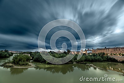 The Guadalquivir River on its way through Cordoba, Spain Stock Photo