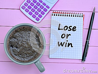 Lose or win words on notebook Stock Photo