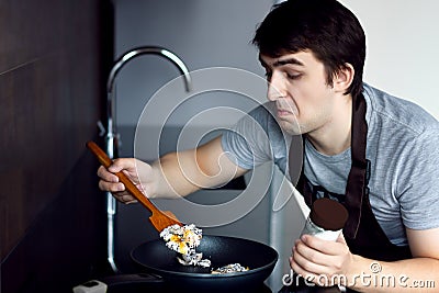 Loser bachelor on modern kitchen concept Stock Photo