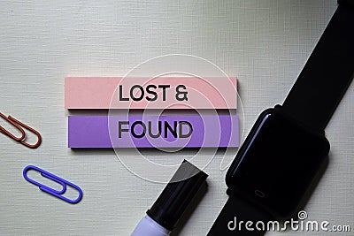 Lost & Found text on sticky notes isolated on office desk Stock Photo