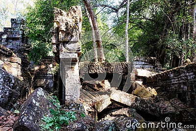 Lost in nature: Ancient ruins of Khmer buildings scattered throughout the Cambodian forest, creating an enchanting landscape Stock Photo