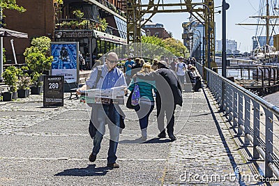 A lost tourist looking at the map in madero Port Editorial Stock Photo