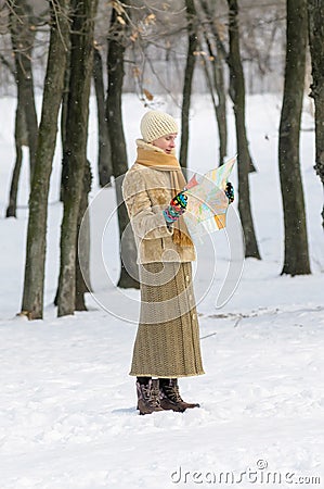 Lost woman with a map Stock Photo