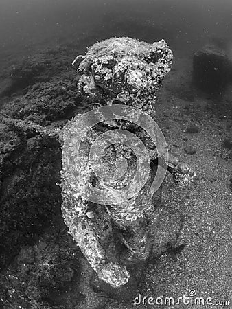 Statue of Dionysus with a crown of ivy in Claudioâ€™s Ninfeum. underwater, archeology. Stock Photo