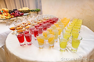 A lot of alcohol drinks on buffet table, catering Stock Photo