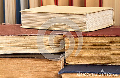 Lot of books on the table in the library Stock Photo