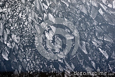 Many broken small ice floes floating on the river aerial aerial view Stock Photo