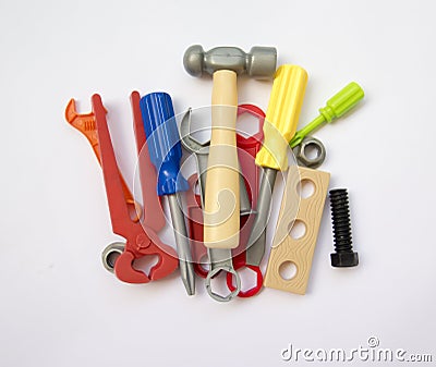 A lot of children's toy instruments gathered in a pile, bright c Stock Photo