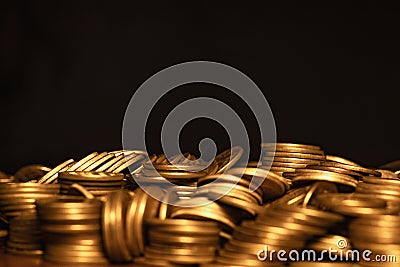 Concept photo.Coins close-up on the table. A lot of coins, selective focus.Front view of stacks of Euro coins.Simple and Stock Photo