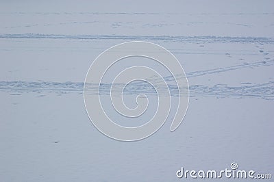 Human traces on the snow Stock Photo