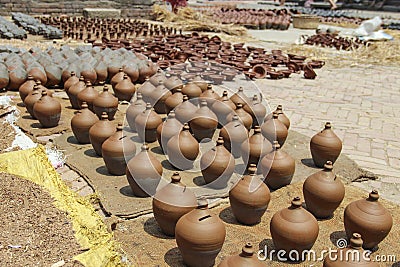 A lot of orange pots. Traditional Ceramic Pottery in Bhaktapur Town, Nepal Stock Photo