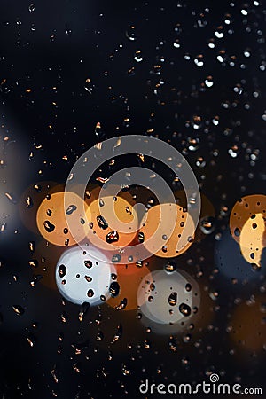 Abstract background with bokeh - raindrops on window, night sky Stock Photo