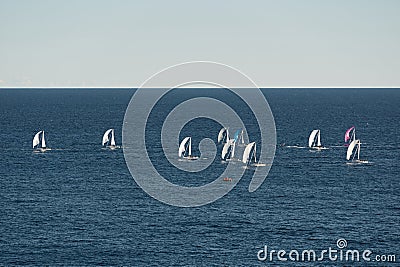 A lot of sail boats and yachts in the sea went on a sailing trip near port Hercules in Monaco, Monte Carlo, sail regatta Editorial Stock Photo