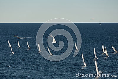 A lot of sail boats and yachts in the sea went on a sailing trip near port Hercules in Monaco, Monte Carlo, sail regatta Editorial Stock Photo