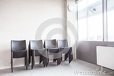 Lot of stacked chairs Stock Photo
