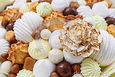 A lot of sweets, such as: marshmallows, sweets, chocolate, biscuits, nuts as a background or backdrop Stock Photo