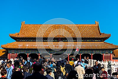 A lot of tourists entering the Taihe Palace, Hall of Supreme Harmony of the Forbidden City, the main buildings of the royal palace Editorial Stock Photo