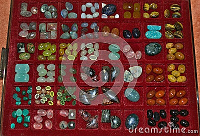 Lot of various different crystals displayed in showcase Stock Photo