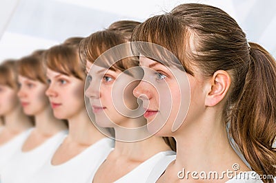 A lot of women - genetic clone concept Stock Photo