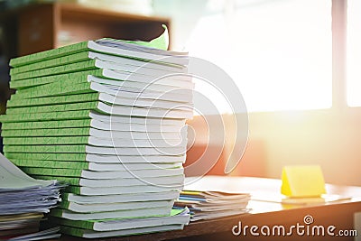 Lot of work document file working and book stacks of paper files searching information on work desk office - business report Stock Photo