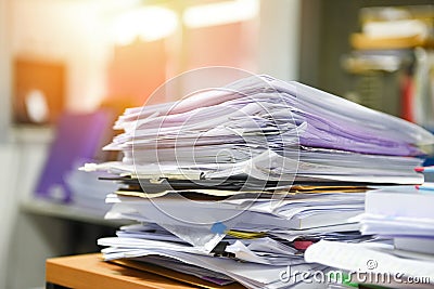 Lot of work document file working stacks of paper files searching information on work desk office - business report papers piles Stock Photo