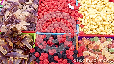 Lots of candy fruit gums, candies at the market stall Stock Photo