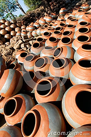 Round clay pots drying Stock Photo