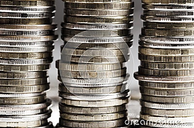 Lots of coins. The concept of investing or saving money or a financial crisis Stock Photo